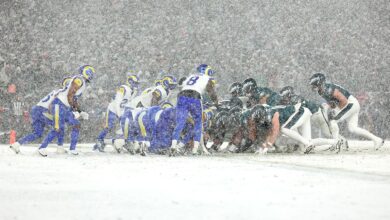 Barkley runs for 78 and 62 yard tds in the snow and eagles top rams 28 22 to head to nfc title game