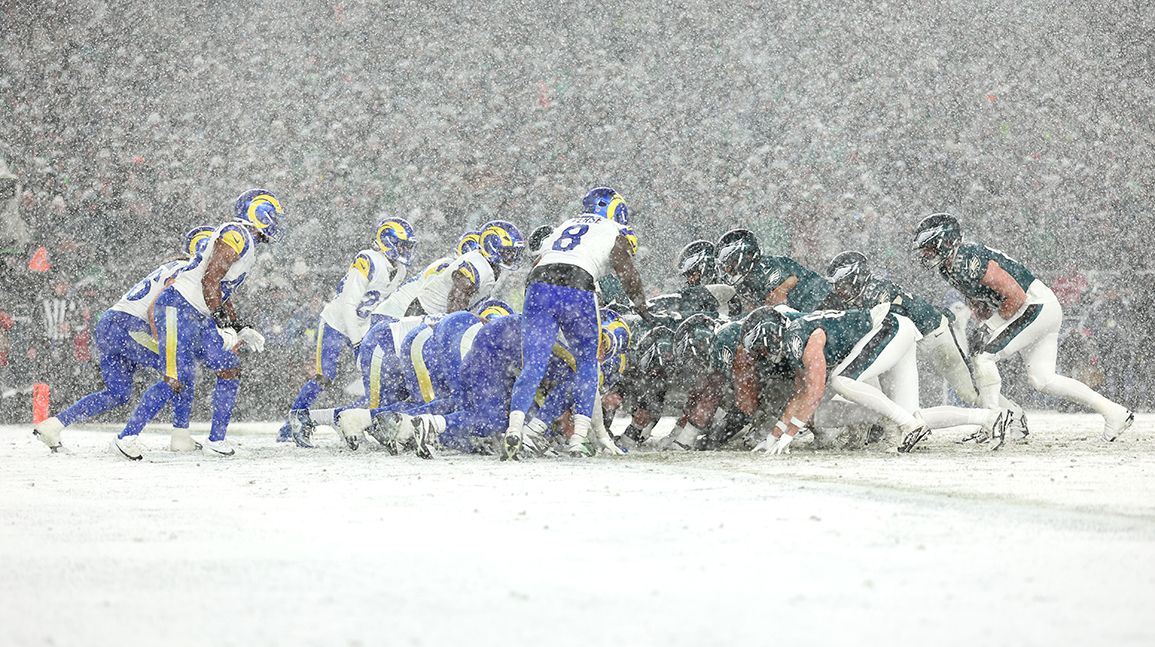 Barkley runs for 78 and 62 yard tds in the snow and eagles top rams 28 22 to head to nfc title game