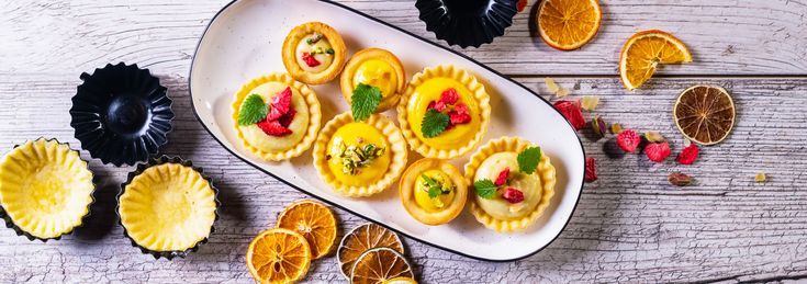Citrus tartlets combine tangy lemon and orange bites in a buttery pastry