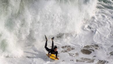 Big waves slam southern california beaches more massive surf on the way
