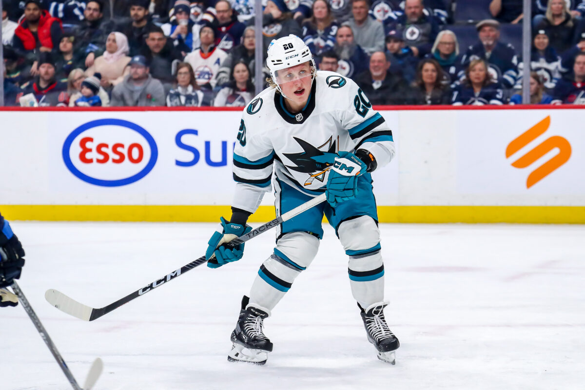 Celebrinis goal and askarovs save on penalty shot lead the sharks to 2 1 win over the penguins