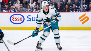 Celebrinis goal and askarovs save on penalty shot lead the sharks to 2 1 win over the penguins