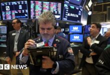 Wall street falls following trumps tariffs but not as badly as feared in the morning
