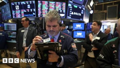 Wall street falls following trumps tariffs but not as badly as feared in the morning